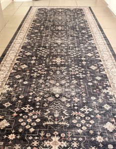 lot 2049 image: Hazo Haus carpet fun pattern green with white flower looking approximately 4 ft x 2 ft
