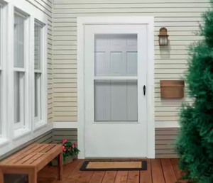 32 in. x 80 in. White Universal 3/4 Light Vinyl Storm Door *Retails $154*