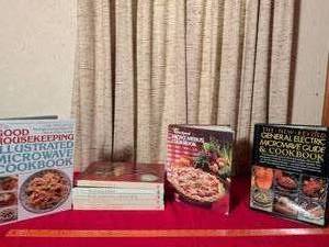 lot 346 image: Cookbook Lot Good Housekeeping Microwave, General Electric Microwave Guide, Whirlpool Micro Menus, Foods of the World Series 5 Books