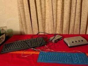 lot 358 image: Wired Computer Keyboards, 4-Input Selector Box, and AV Converter Box Lot