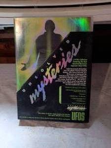 lot 449 image: Unsolved Mysteries UFOs 4-Disc Collection DVD Box Set