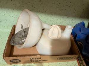 lot 533 image: Food Mill Kitchen Gadget with Perforated Disk
