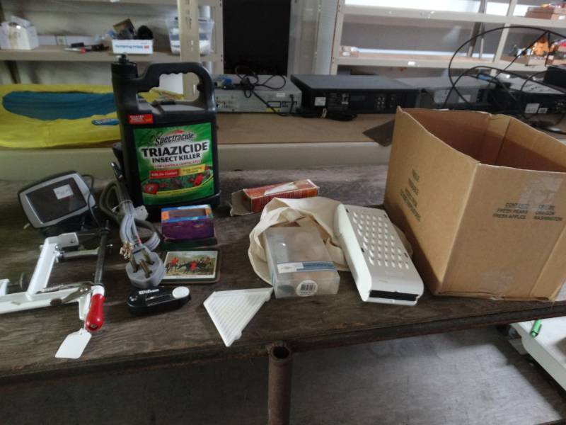 lot 4107 image: Candles, fruit peeler, garmin, and more