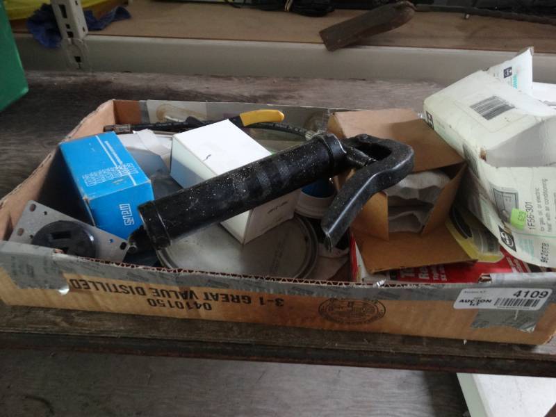 lot 4109 image: Grease gun, toilet bowl gasket, flush lever and more