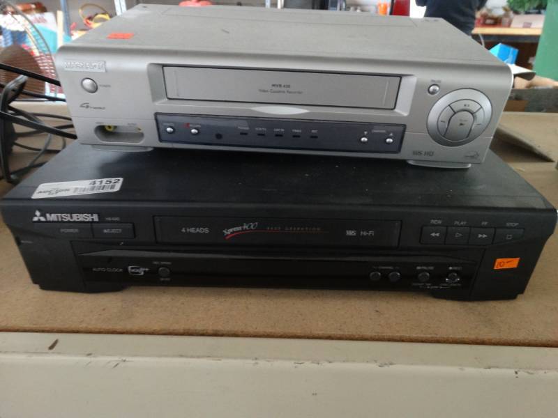 lot 4152 image: 1- Magnavox VHS player and a Mitsubishi VHS player.