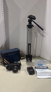 lot 1011 image: Canon T50 Camera with Tripod, Flash and Accessories