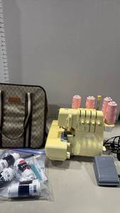 lot 1016 image: Baby Lock Eclipse SX serger sewing machine, with thread and carrying case