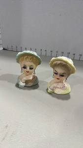 lot 1021 image: Lady head planters 3 inches tall