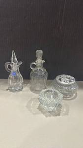 lot 1030 image: Pewter potpourritrinket dish, cruets and candle holder
