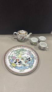 lot 1034 image: Chinese porcelain teapot featuring hand-painted panda motifs and gold rim detailing small chip in one cups