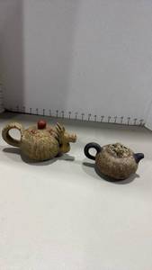 lot 1045 image: vintage Chinese Yixing clay teapot, crafted in the shape of a figural dragon, and Chinese Yixing Zisha teapot featuring a distinct brown and tan marbled clay body with lizard on top