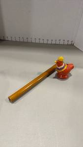 lot 1053 image: Peruvian clay water whistle shaped like a bird and Chinese Traditional Six-hole Flute made with yellow bamboo