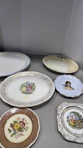 lot 1072 image: Vogue, Homer Laughlin and other decorative plates and serving platters one is chipped in a couple spots