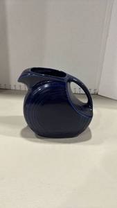 lot 1075 image: Vintage Fiesta Ware cobalt blue disc pitcher 7 inches tall