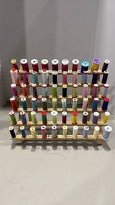lot 1106 image: Sewing Thread Spool Rack with Approximately 60 Spools Mixed Colors