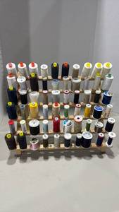 lot 1107 image: Sewing Thread Spool Rack with Approximately 60 Spools Mixed Colors