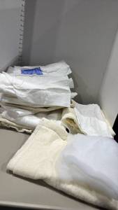lot 1138 image: Lot of White and Cream Fabric Pieces and Batting Sections