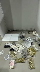 lot 1140 image: Various sizes of grommets and more