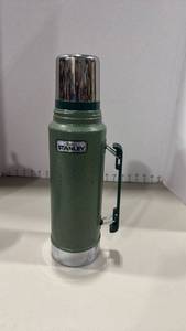 lot 1229 image: Aladdin Stanley Vacuum Insulated Bottle Thermos with Cup