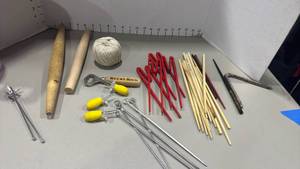 lot 1244 image: Wooden and plastic chop sticks, rolling pins, corn on cob holders and more