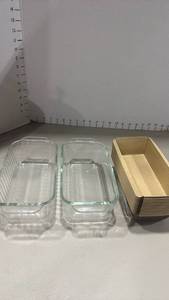 lot 1260 image: Pyrex glass loaf pans and paper liners