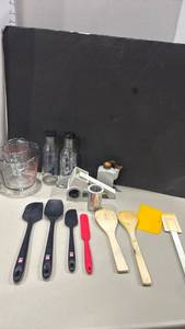 lot 1306 image: The pampered chef rotary cheese grater, utensils, glass bottles with dressing recipes and more
