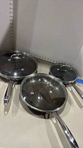 lot 1313 image: Hexclad 3-Piece Cookware Set with Glass Lids and Handles