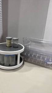 lot 1323 image: The Pampered Chef grate and store containers, 2 tier lazy Susan spice rack and more