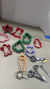 lot 1329 image: Cookie cutters and measuring spoons