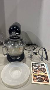 lot 1345 image: Kitchen Aid stand mixer with attachments with recipe booklet