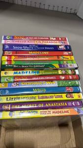 lot 1367 image: DVD Bundle Hello Kitty, Snow White, Madeline, Chicka Boom,How the Grinch stole Christmas