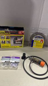 lot 2072 image: Stanley Electric StaplerNailer Home Repair Kit with BrassCraft Drain Auger and Hooks Lot