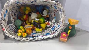 lot 2087 image: Lot of Rubber Duckies and Toy Figurines in Newspaper Basket