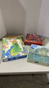 lot 2103 image: Jigsaw puzzles 1000 pieces ea