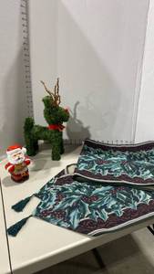 lot 2126 image: Vintage Santa Supertoys friction toy, table scarf and reindeer