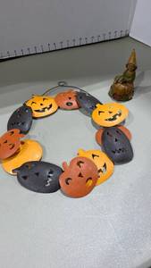 lot 2132 image: Metal Halloween wreath and witch figurine