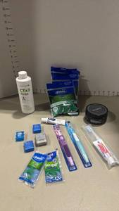 lot 2144 image: Floss picks, toothpaste and more