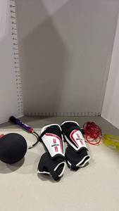 lot 2166 image: Shin guards, jump ropes