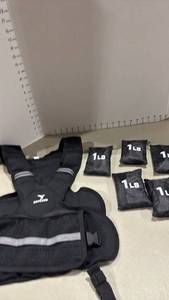 lot 2167 image: Weighted vest with extra weights
