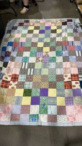 lot 2184 image: Patchwork quilt with some damage 82.5x65