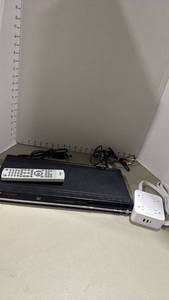 lot 2200 image: Toshiba dvd player with remote and power strip