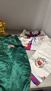 lot 2204 image: silk Qipao features traditional floral embroidery and silk embroidered Chinese robe and pants set kids size 2 and 4 along with lucky cat statue