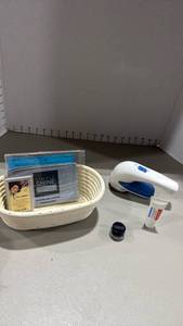 lot 2211 image: Conair lint shaver, Polishing Cloth, and Accessories