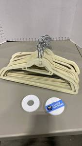 lot 2241 image: Non-slip beige hangers and closet dividers