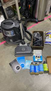 lot 2315 image: Rainbow vacuum with accessories and Aquamate cleaning solutions and scents