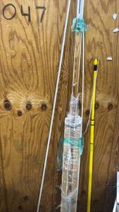 lot 2339 image: Window Frame Channel Track System 8 feet long  and lightbulb changer