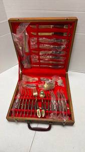 lot 903 image: Vintage Siam bronze and wood flatware set with embossed Thai Buddha on handle 29 pieces total with box