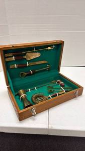 lot 904 image: Vintage Siam bronze and wood barware set with embossed Thai Buddha on handle 9 pieces total with box