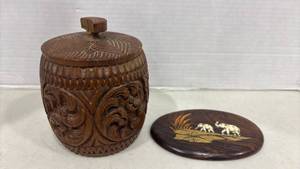 lot 1023 image: Hand Carved Wood Jar with Lid and Wood Plaque with Inlay. Jar is 6 inches tall