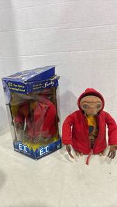 lot 1072 image: Two E.T. Interactive Action Figures with Red Jacket. One is in box and other comes without.